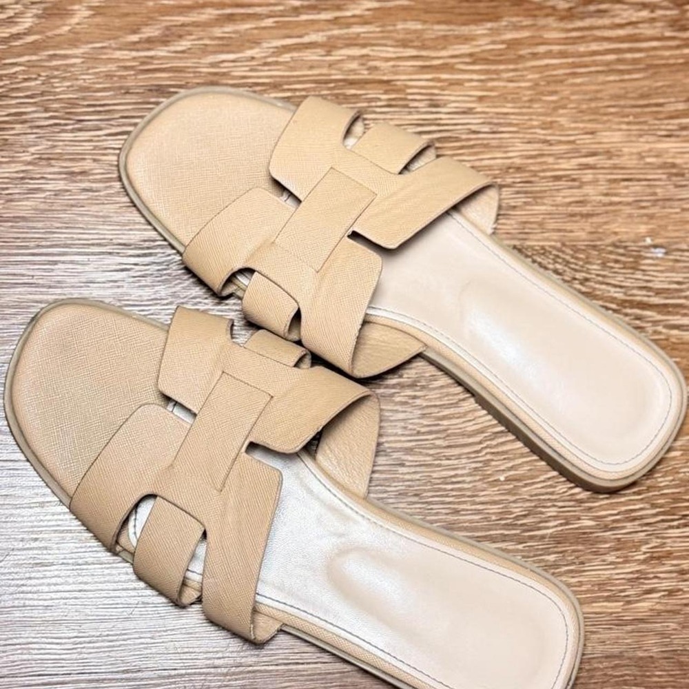 Tan leather slides with a boho vibe